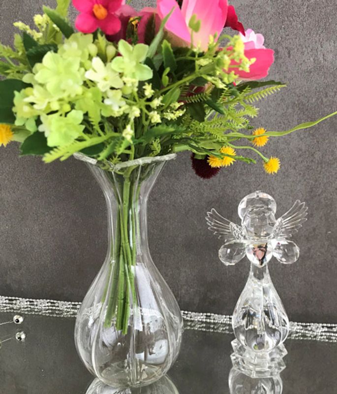 Blomstervase, liten, i glass.