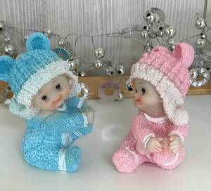 Bilde av Bordpynt, lys blå kledd baby, ...