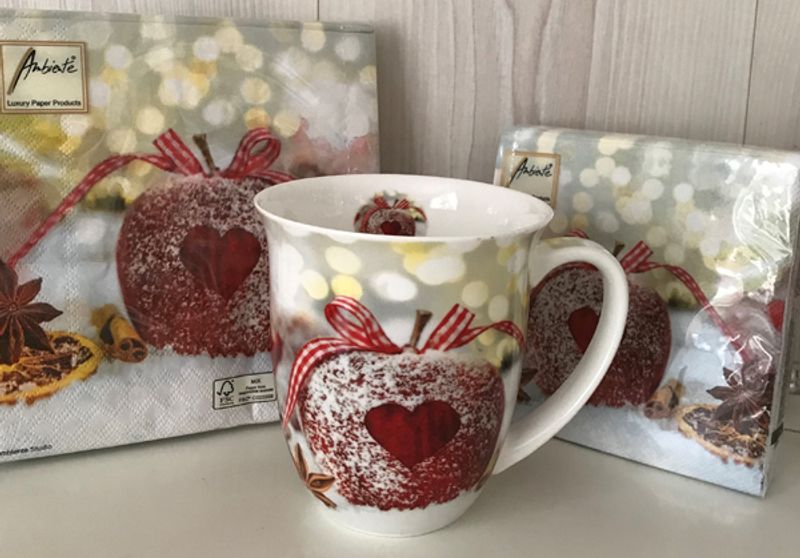 Brikke med motiv av et eple med r&oslash;dt hjerte